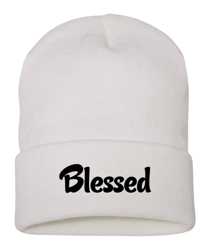 White hypoallergenic acrylic cuffed Beanie written "blessed" in a black font as a reminder of gratitude and positivity.